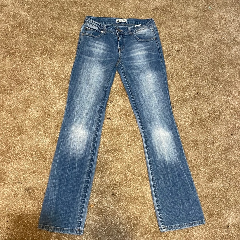 l.e.I boot cut jeans. Size 26 ish or size 5 but fits a little smaller.